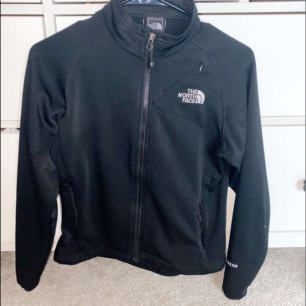 black north face zip up jacket